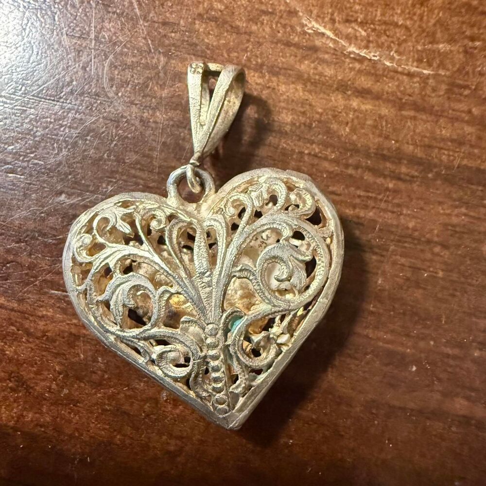 Sterling Silver heart pendant with filigree floral design